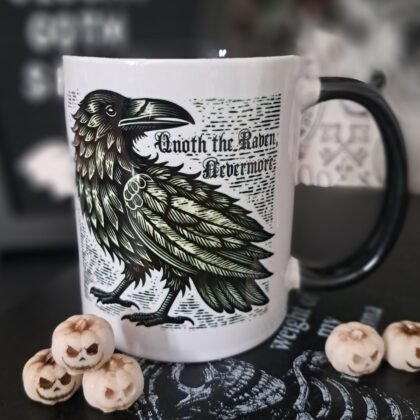 Gothic raven coffee mug with black handle and interior featuring “Quoth the Raven, Nevermore” design