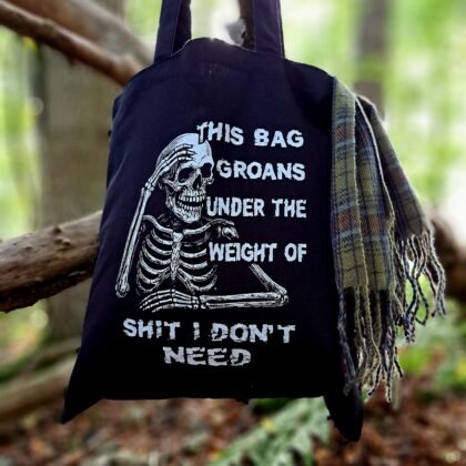 Gothic skeleton tote bag with sarcastic slogan This Bag Groans Under The Weight Of Shit I Don’t Need