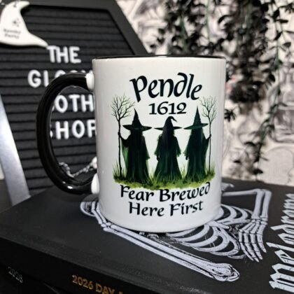 Pendle 1612 witch mug with “Fear Brewed Here First” text and black handle
