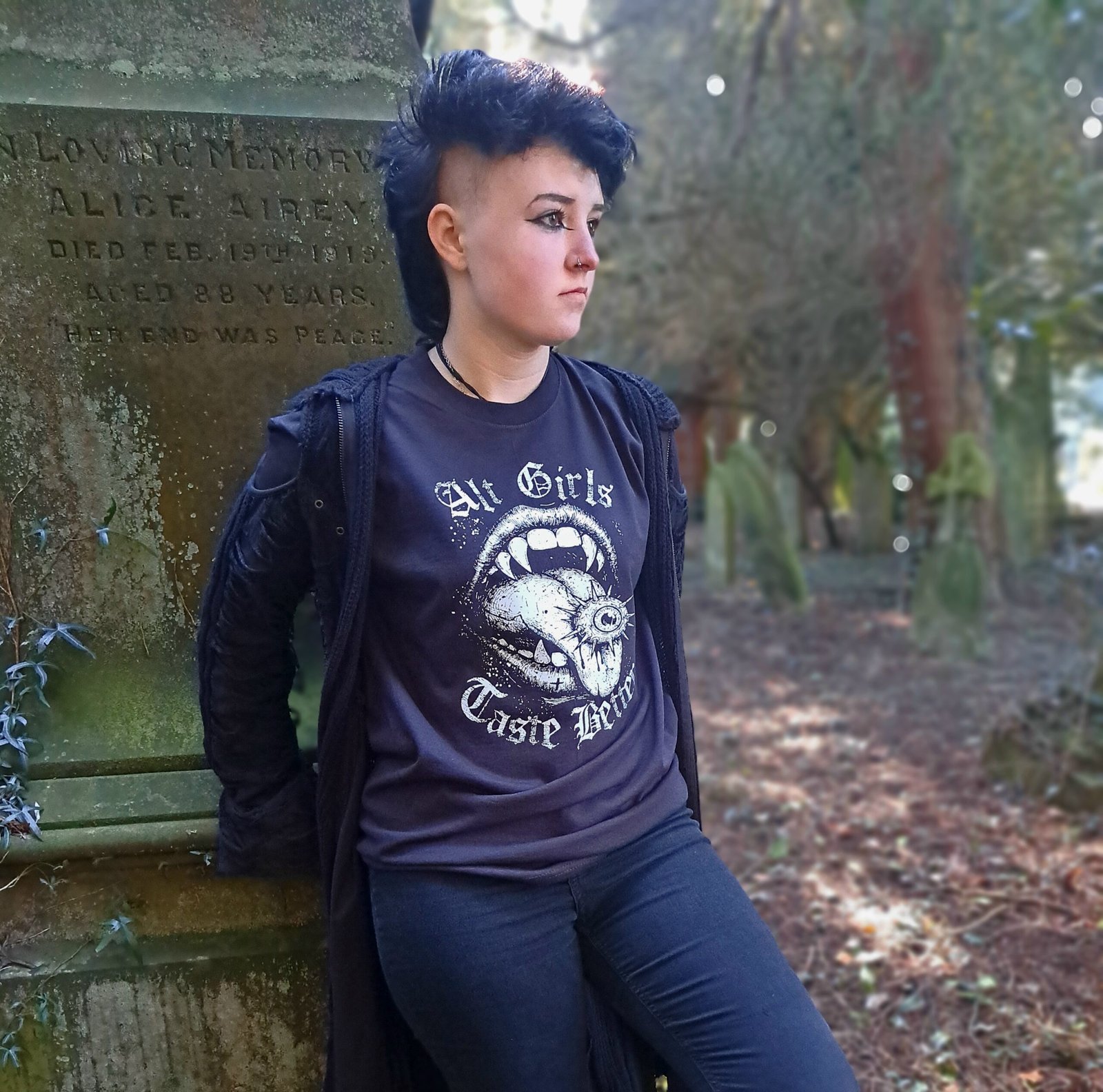 Model wearing Alt Girls Taste Better alternative emo graphic t shirt with vampire mouth design printed on black cotton tee