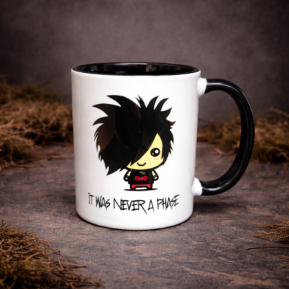 Emo gothic mug with cute character and “it was never a phase” text on moody stone background