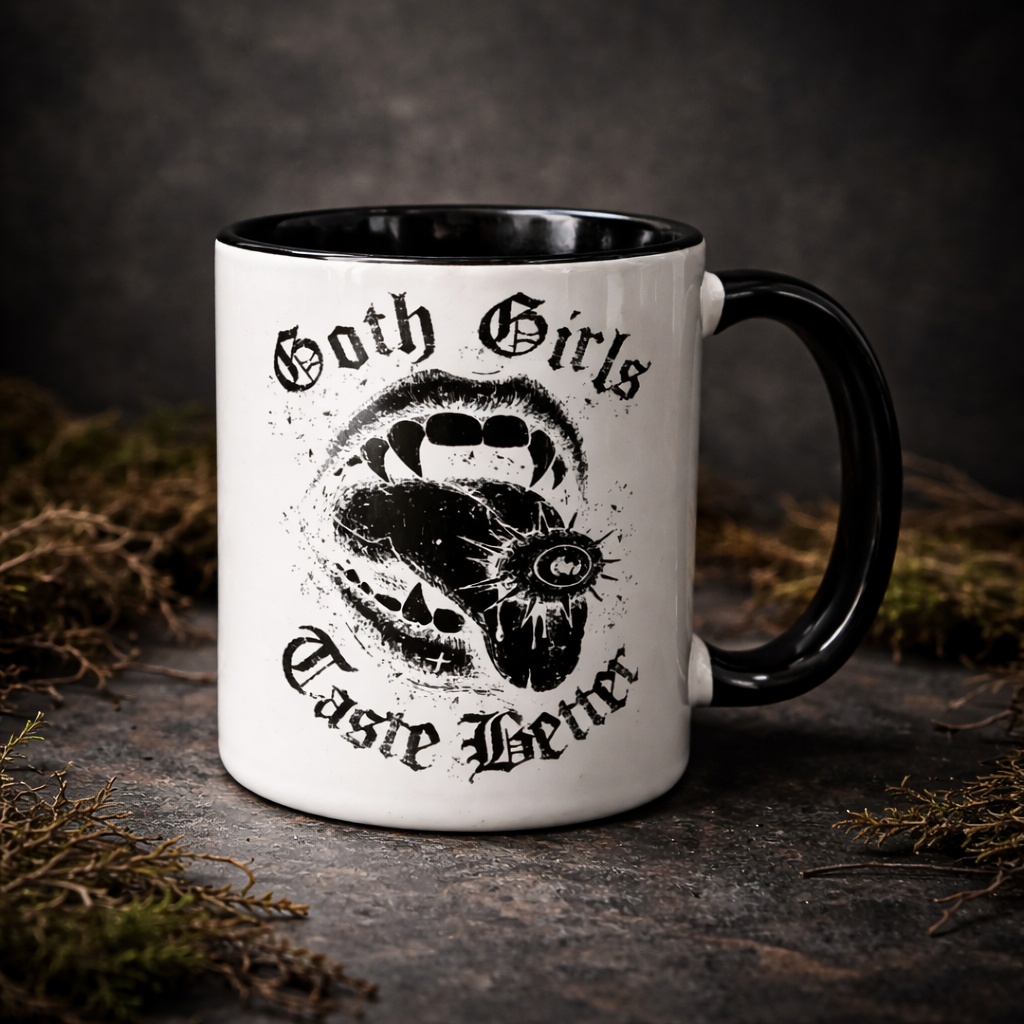 Goth Girls Taste Better gothic coffee mug with vampire mouth design on black handle ceramic mug against dark textured background