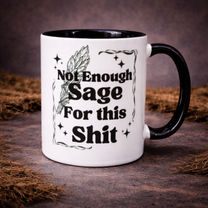 Not Enough Sage For This Shit gothic coffee mug with witchy sage design on black handle ceramic mug on dark textured background