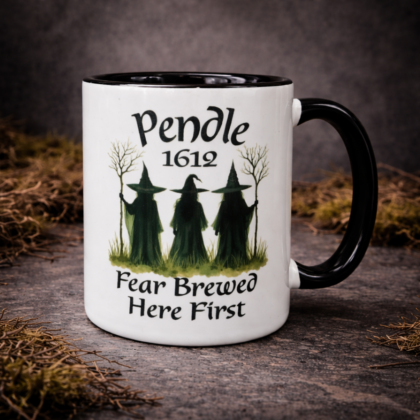 Pendle 1612 witch mug with three witches design and Fear Brewed Here First text on black handle gothic coffee mug