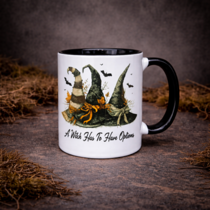 Witch mug with witch hats illustration and a witch has to have options text on stone background