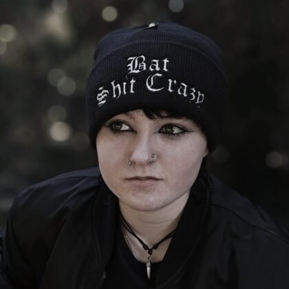 black gothic beanie worn alternative fashion embroidered text design