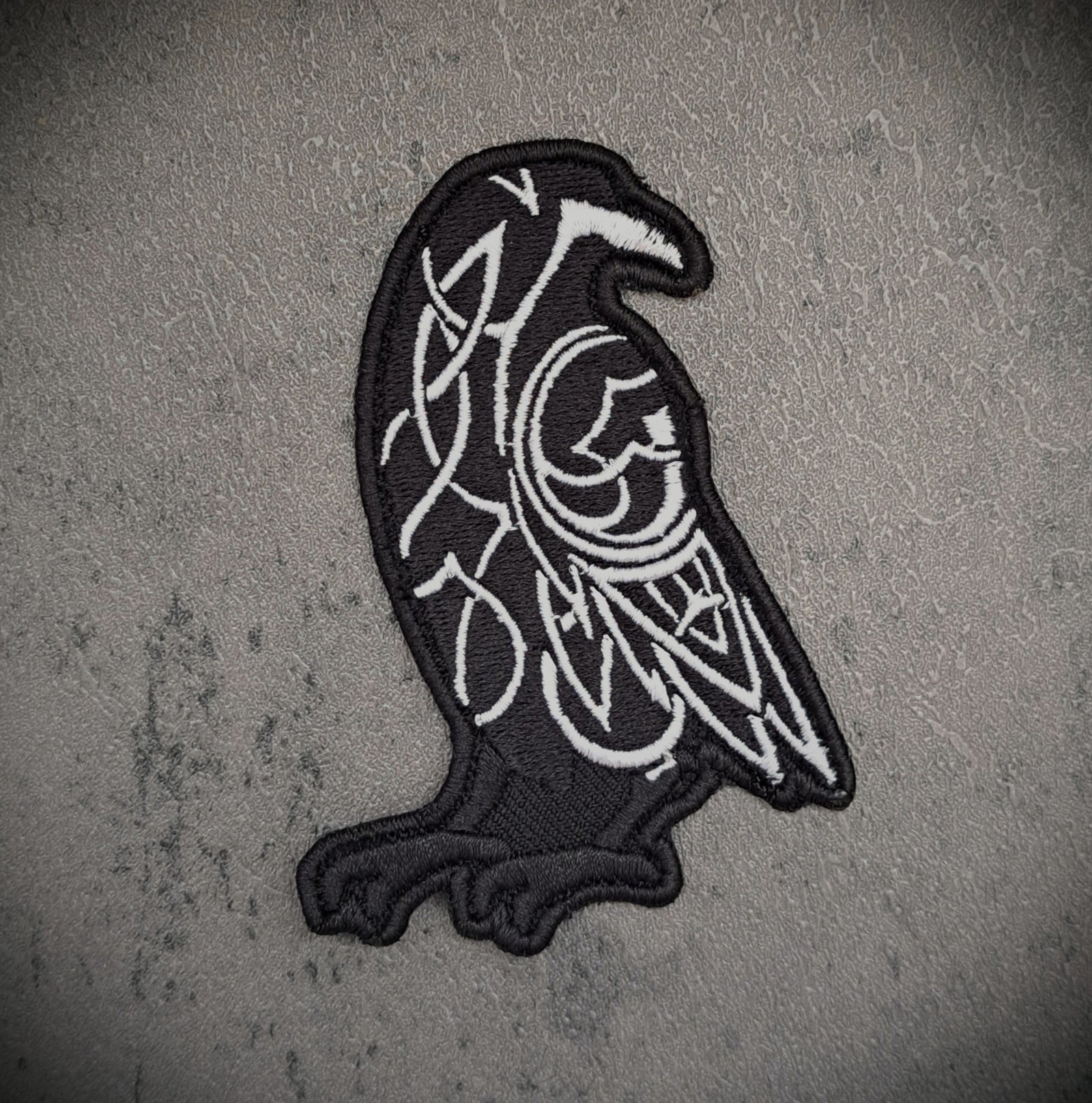Odin raven embroidered patch in black and white Norse gothic design