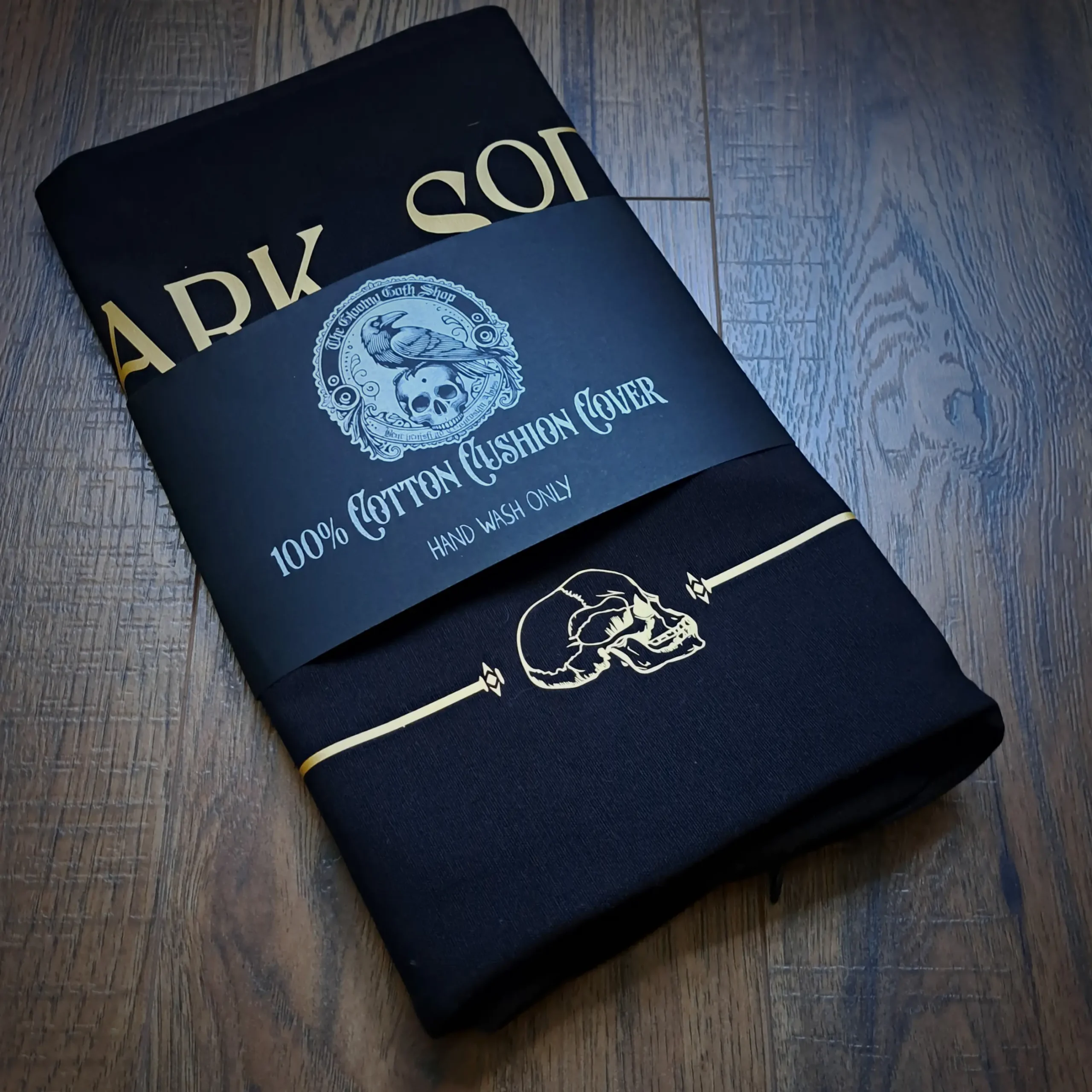Fairtrade cotton Dark Souls gothic cushion cover folded with Gloomy Goth Shop packaging